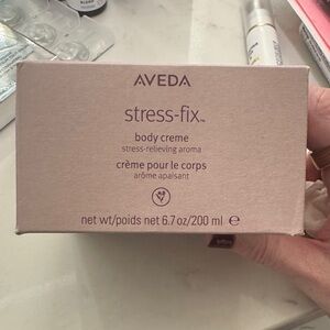 Aveda Stress-Fix Body Creme in Light Pink Jar